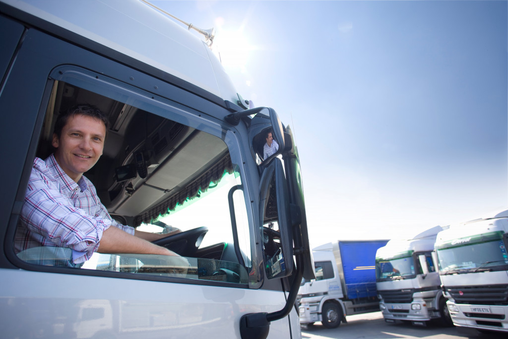 A happy truck driver ready to go